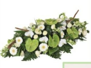 Couvre cercueil en fleurs naturelles du funérarium Simon et Fils rue Saint-Nicolas à Liège