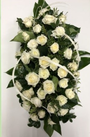 Couvre cercueil en fleurs naturelles du funérarium Simon et Fils rue Saint-Nicolas à Liège